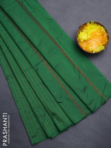Arani semi silk saree green with allover copper zari weaves in borderless style
