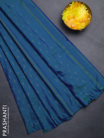 Arani semi silk saree dual shade of bluish green with zari woven buttas in borderless style