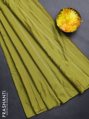 Arani semi silk saree lime green with allover silver zari weaves in borderless style