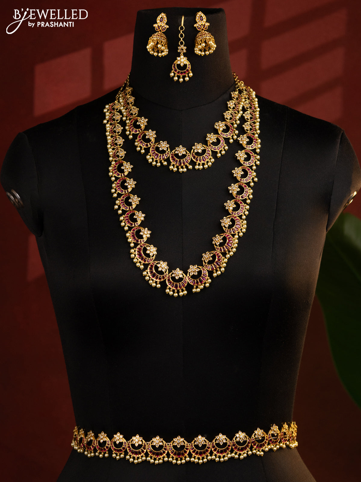 Antique bridal set chandbali design with pink kemp & cz stones and pearl hangings