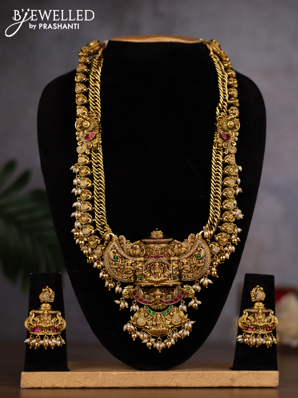 Antique haaram lakshmi design with jadau stones and pearl & golden beads hangings