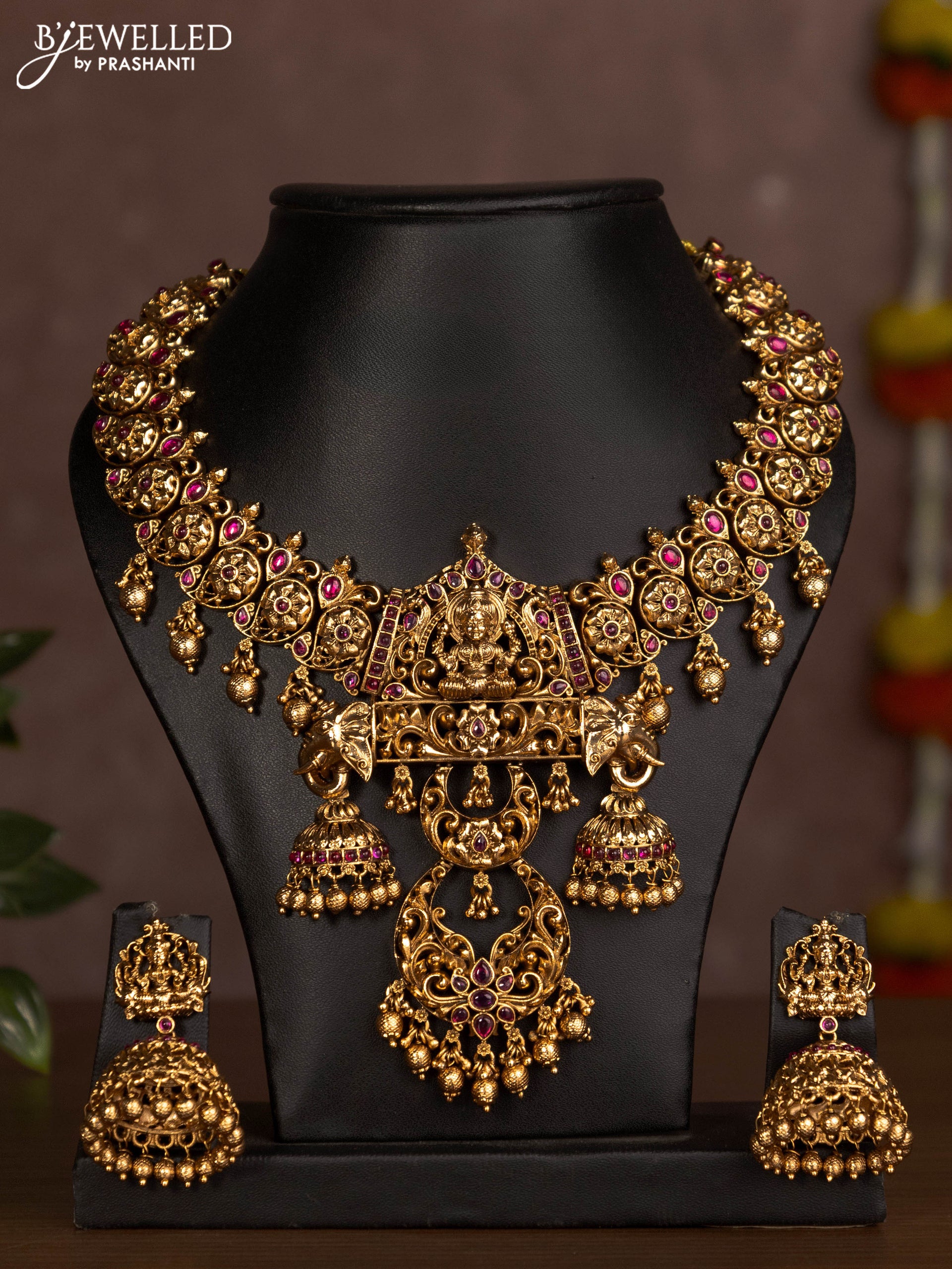 Antique necklace lakshmi design with pink jadau stones and golden beads hanging