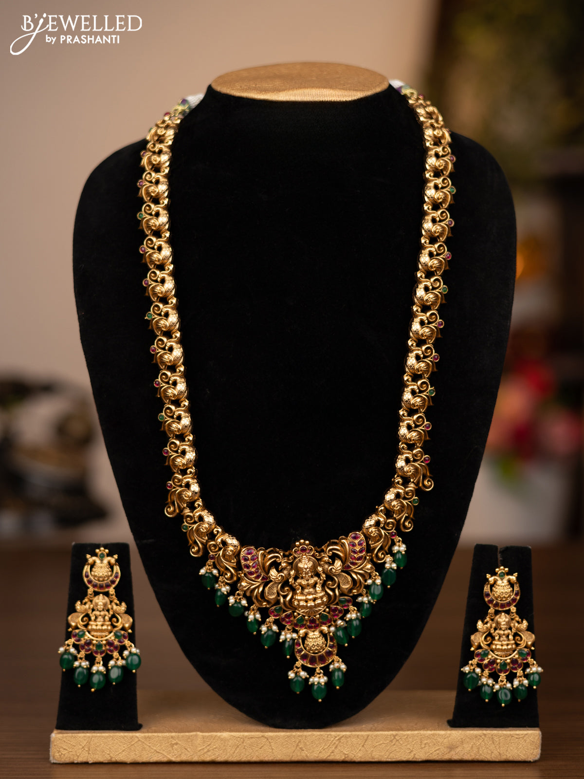 Antique haaram lakshmi design with jadau stones and green beads hanging
