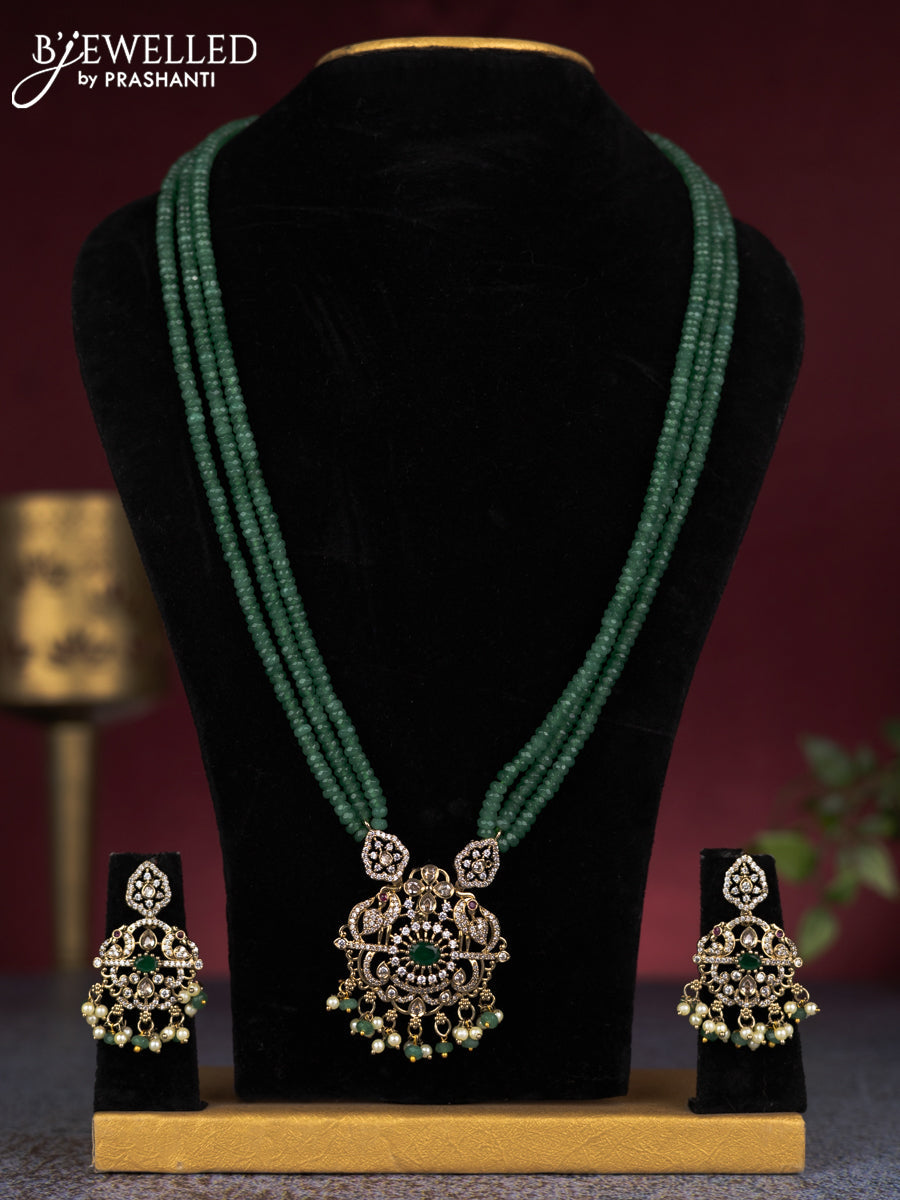 Beaded triple layer mint green necklace peacock design with cz stones and pearl & beads hangings in victorian finish