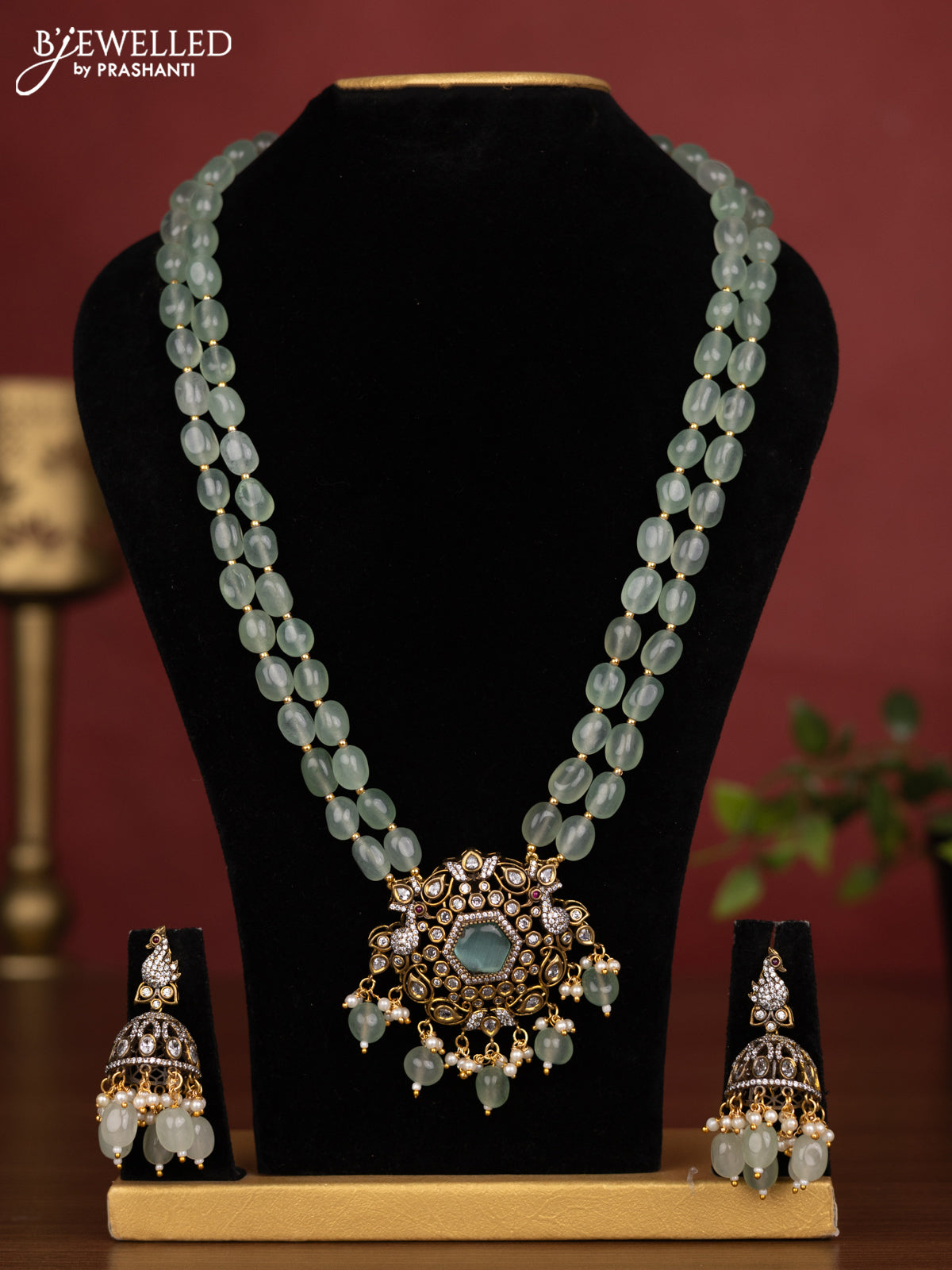 Beaded double layer mint green necklace with cz stones and pearl & beads hanging in victorian finish