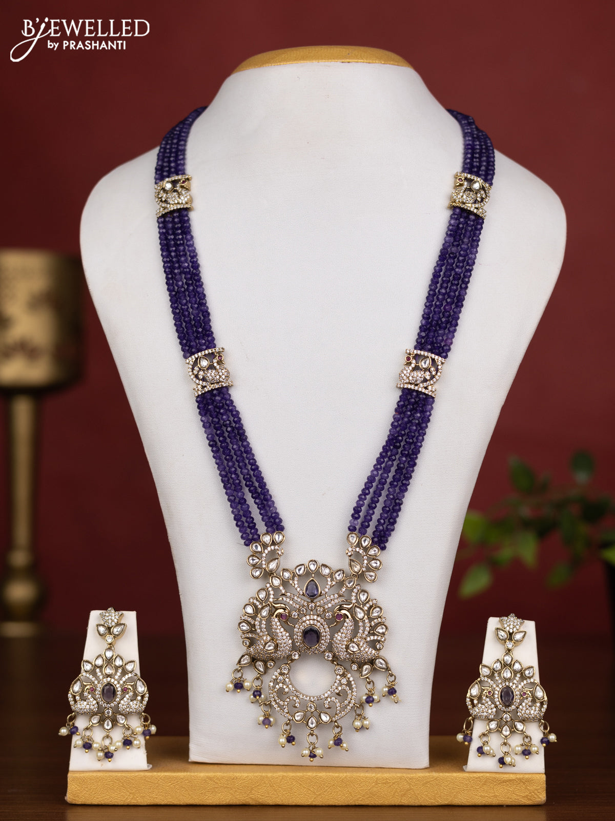 Beaded multilayer violet necklace peacock design with kundan & cz stones and pearl & beads hanging in victorian finish