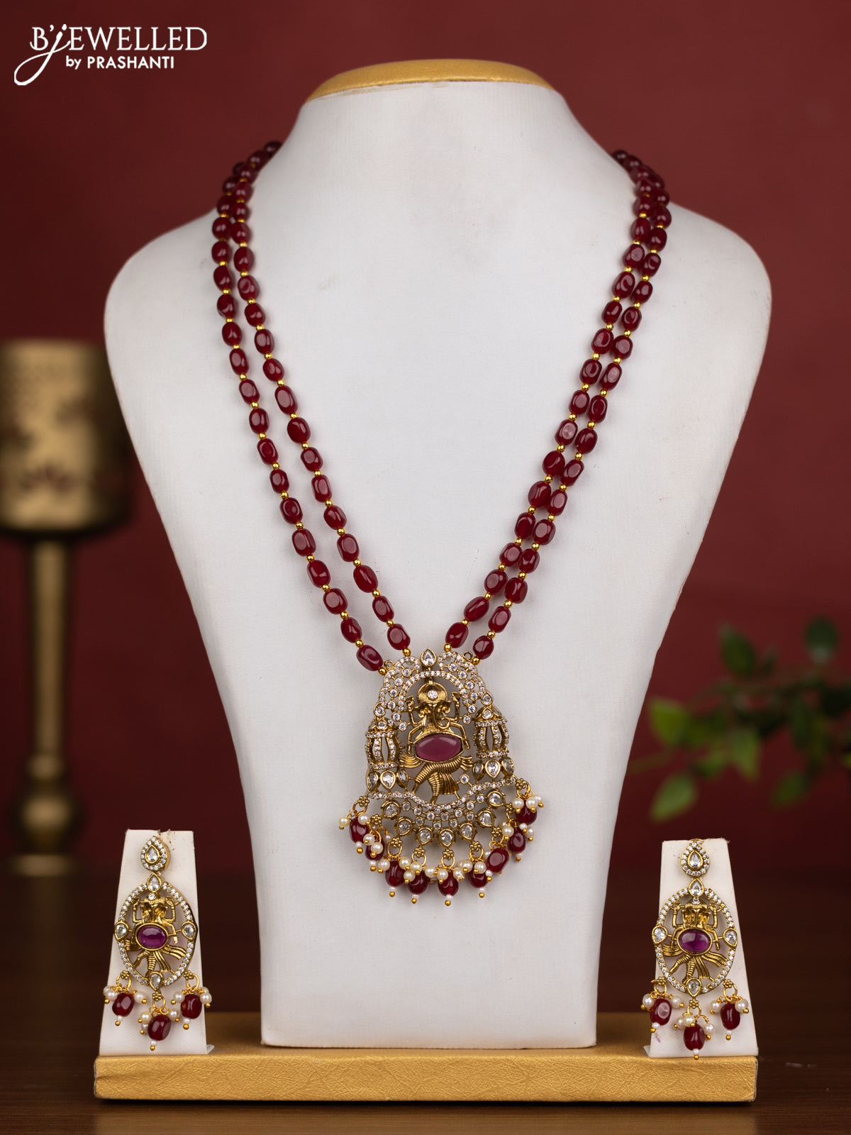 Beaded double layer maroon necklace ganesha pendant with ruby & cz stones and pearl & beads hanging in victorian finish