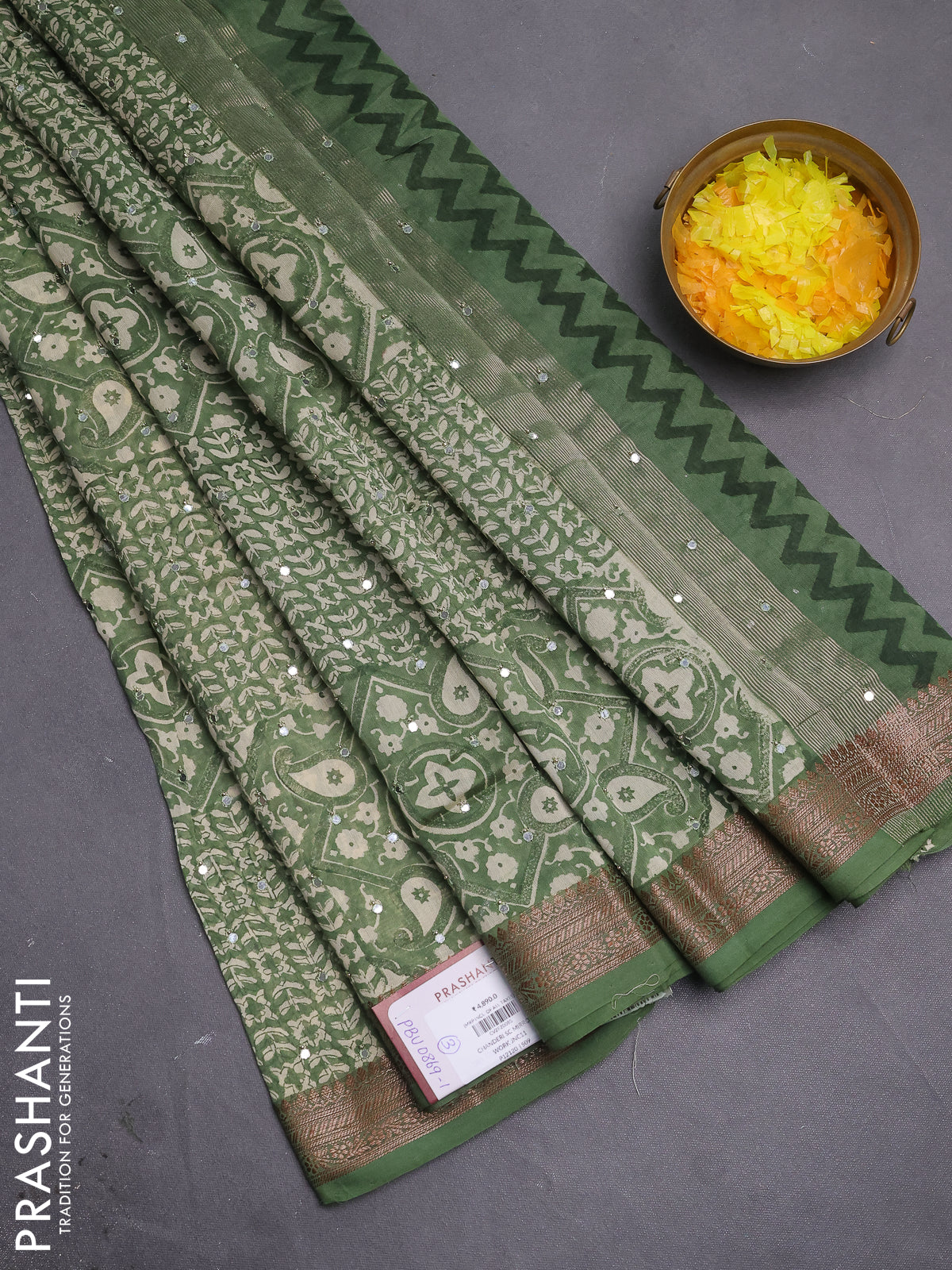 Chanderi silk cotton saree pastel green with allover prints & mirror work and woven border