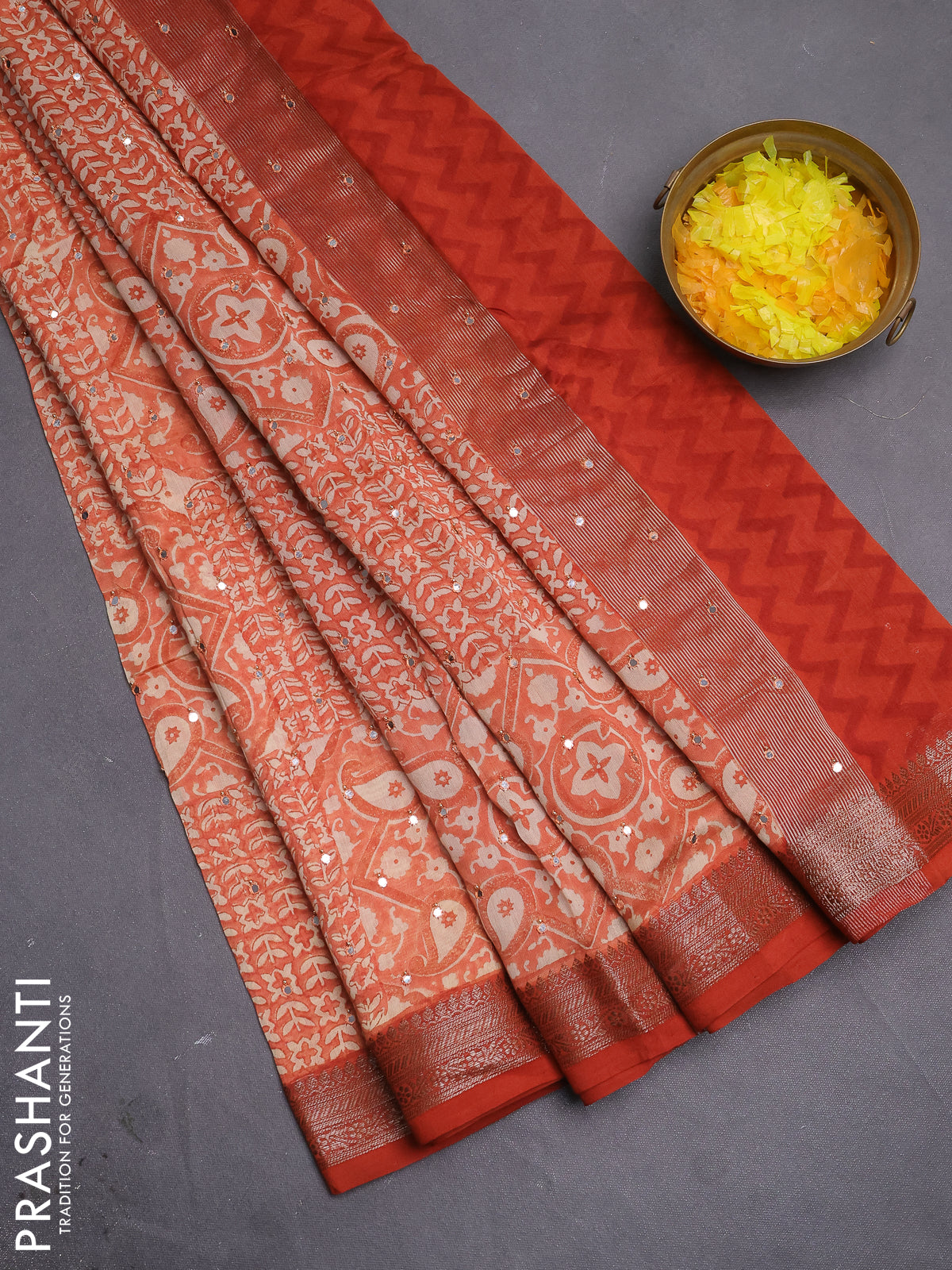 Chanderi silk cotton saree pale orange and orange with allover prints & mirror work and woven border