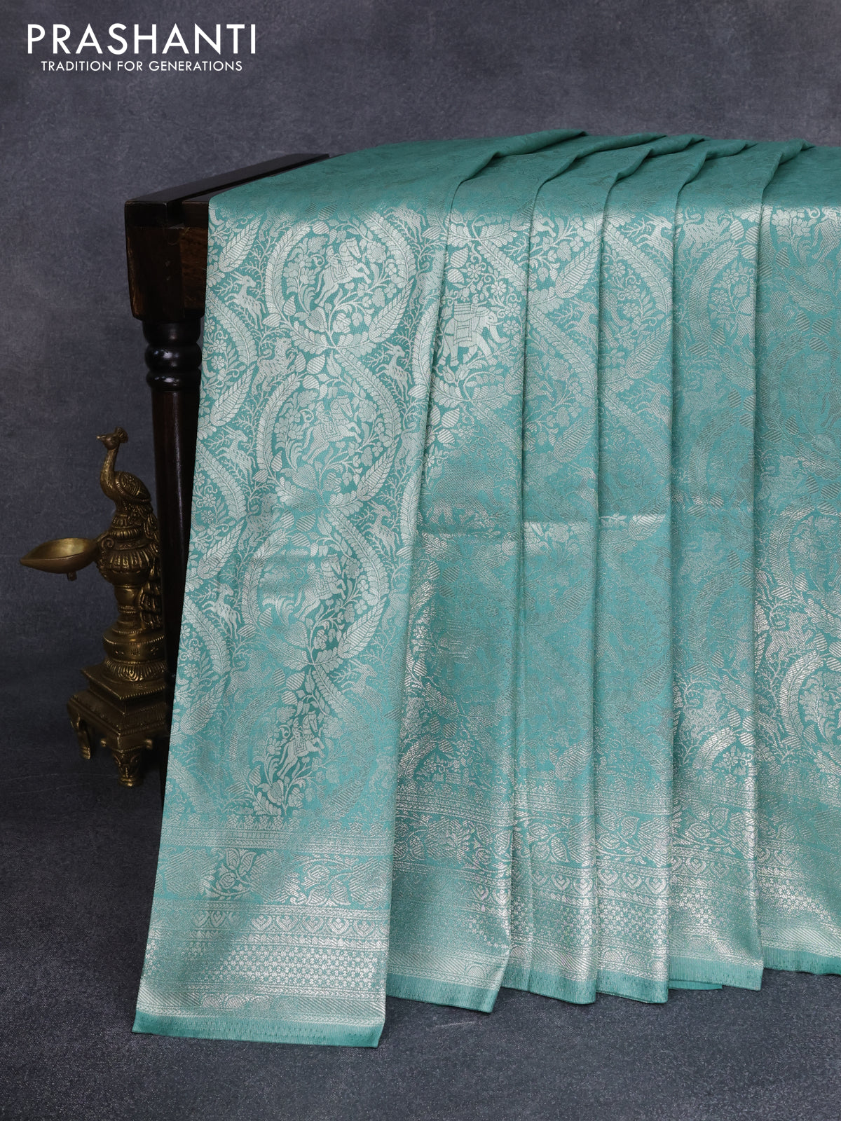 Banarasi silk saree pastel green with allover silver zari woven brocade weaves and silver zari woven border