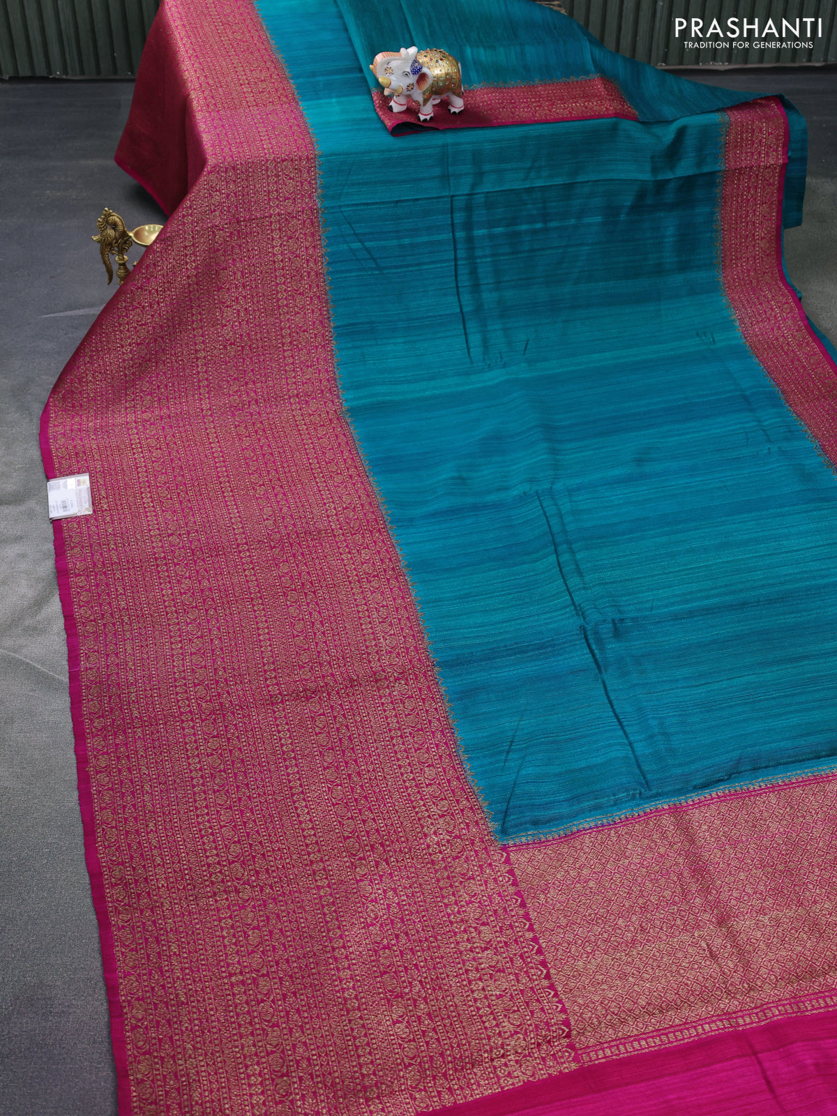 Banarasi raw silk saree teal bluish green and pink with plain body and long zari woven border