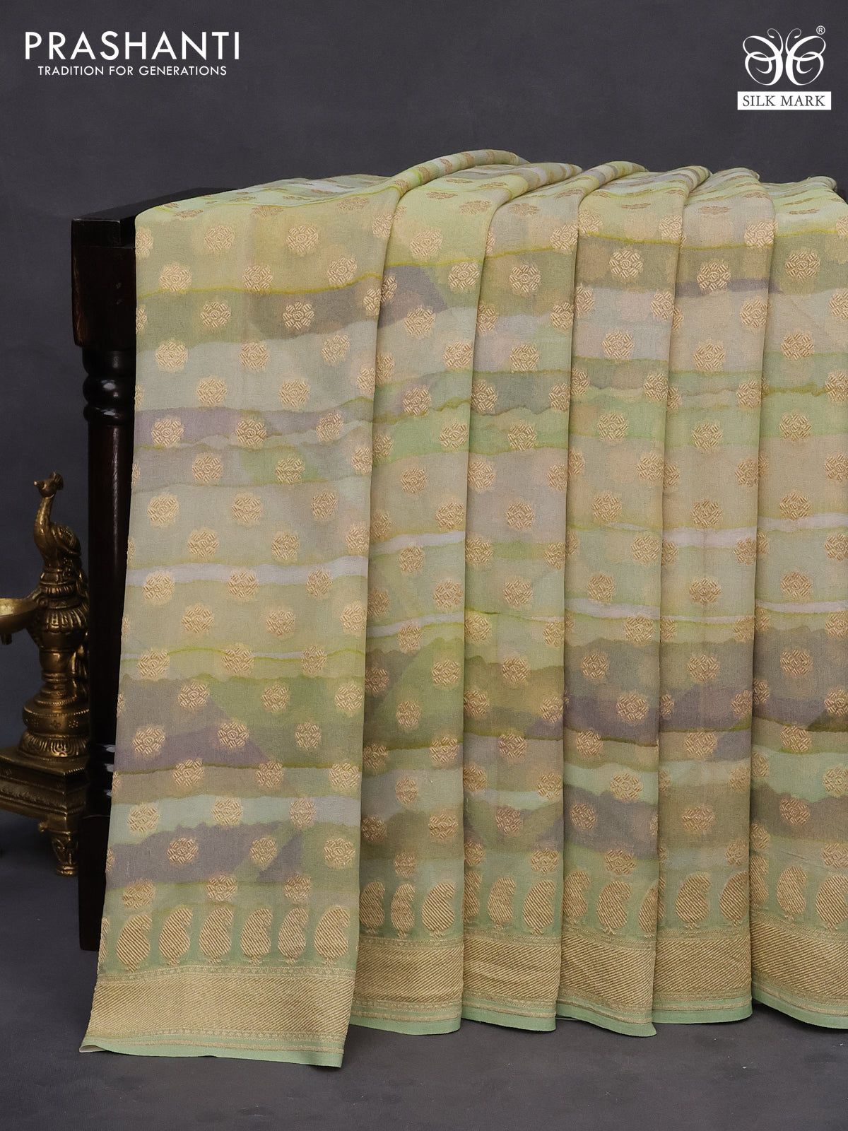 Banarasi georgette silk saree grey and mild pista green with allover zari woven buttas and zari woven border