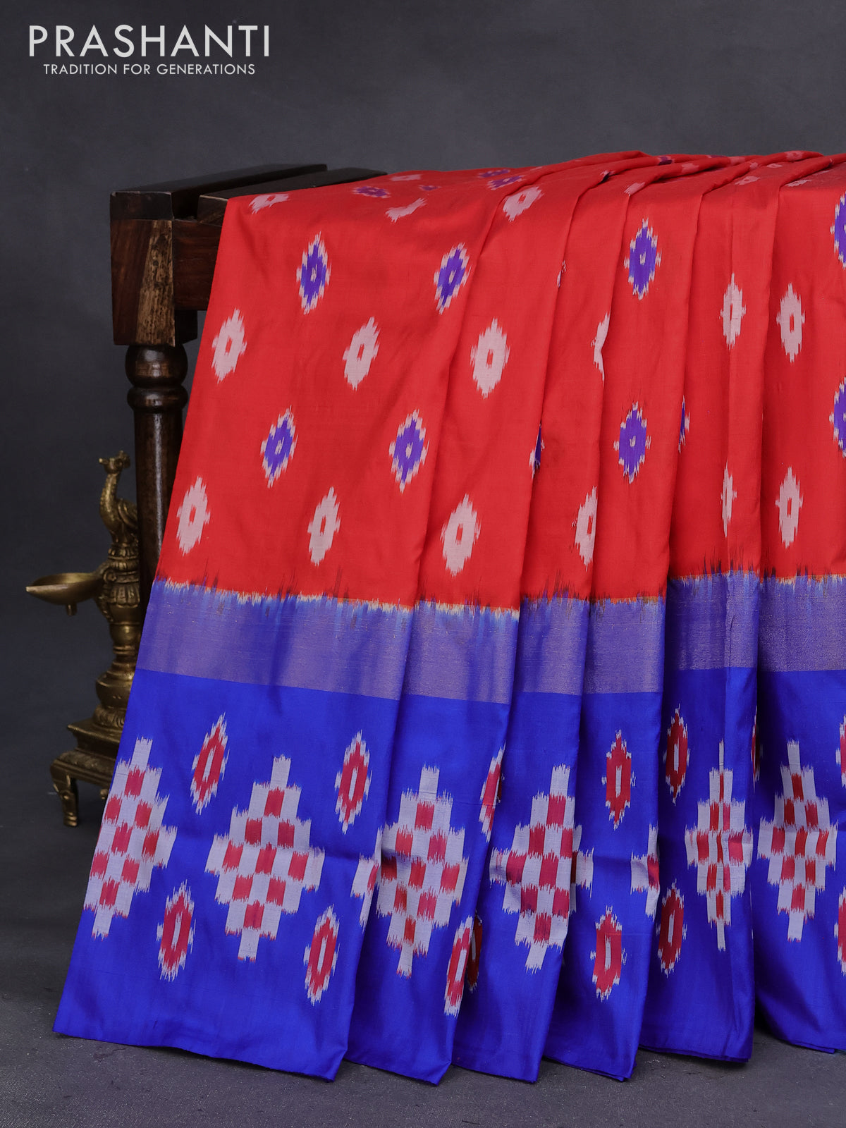 Pochampally silk saree red and blue with allover ikat buttas and long zari woven ikat border