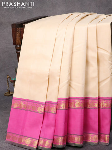 Pure kanjivaram silk saree cream and pink with plain body and rettapet zari woven border & plain body