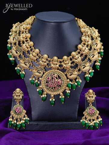 Antique necklace lakshmi and peacock design with kemp stone pendant