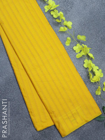 Arani semi silk saree yellow with allover copper zari weaves in borderless style