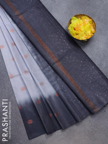 Bamboo silk saree pastel grey and black with copper zari woven floral buttas and sequin work pallu