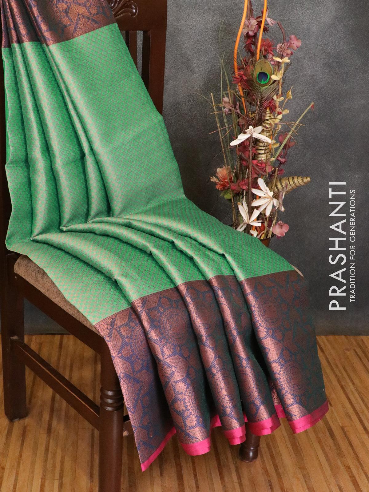 Banarasi kora saree teal green and blue with allover copper zari weaves and long copper zari woven border