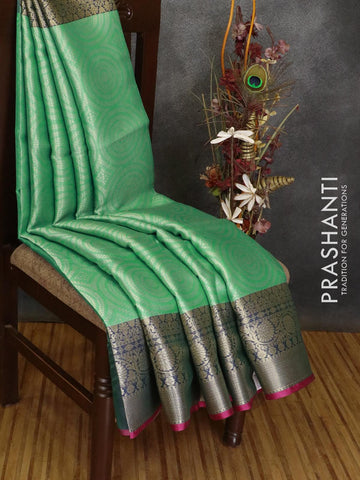 Banarasi kora saree teal green and pink with allover geometric zari weaves and zari woven border