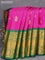 Pure gadwal silk saree pink and green with allover zari woven buttas and long rich annam zari woven border