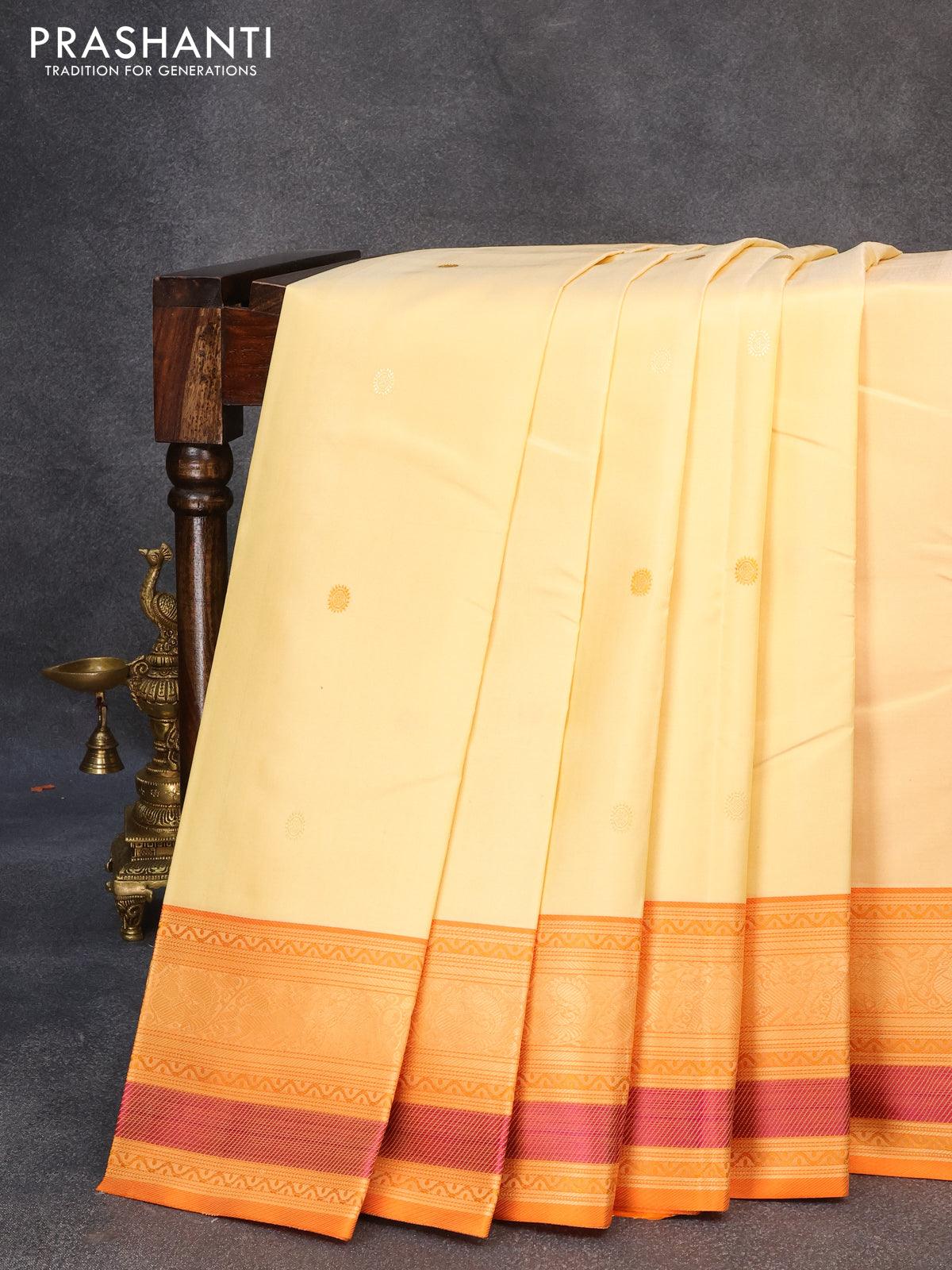 Pure kanjivaram silk saree cream and orange with thread woven buttas and thread woven border zero zari