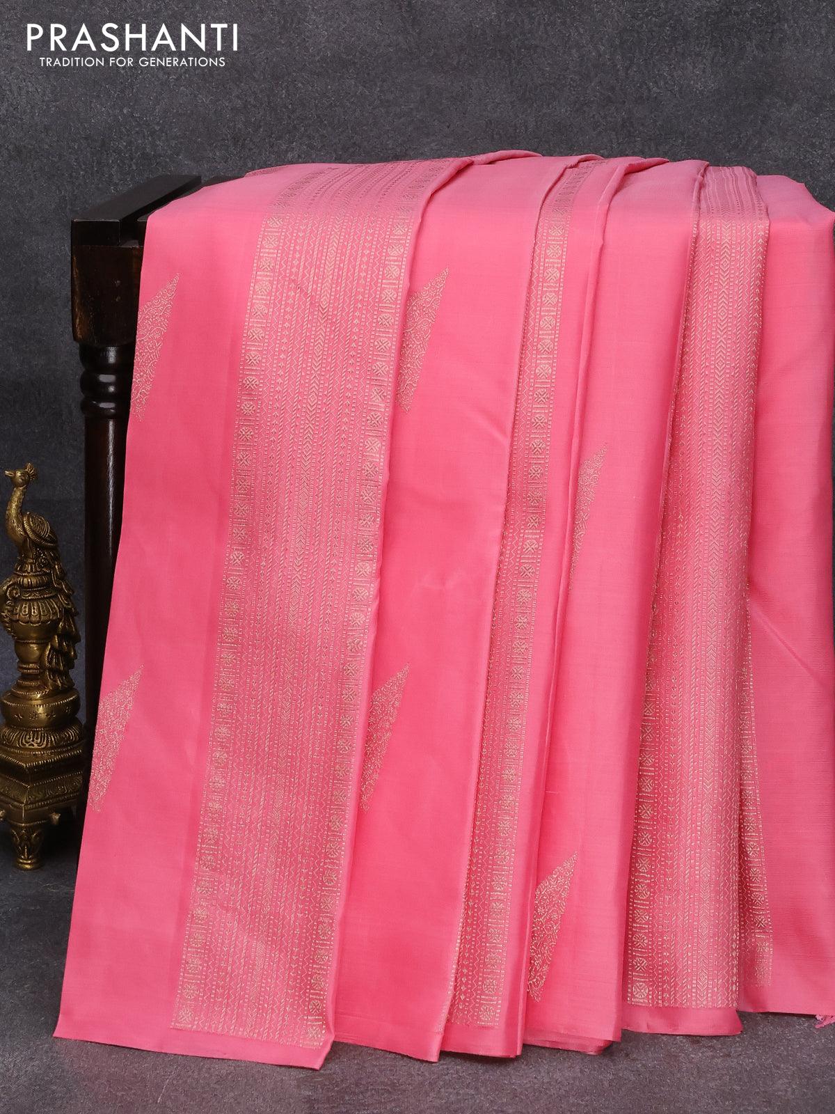 Pure kanjivaram silk saree light pink and peacock blue with zari woven buttas in borderless style