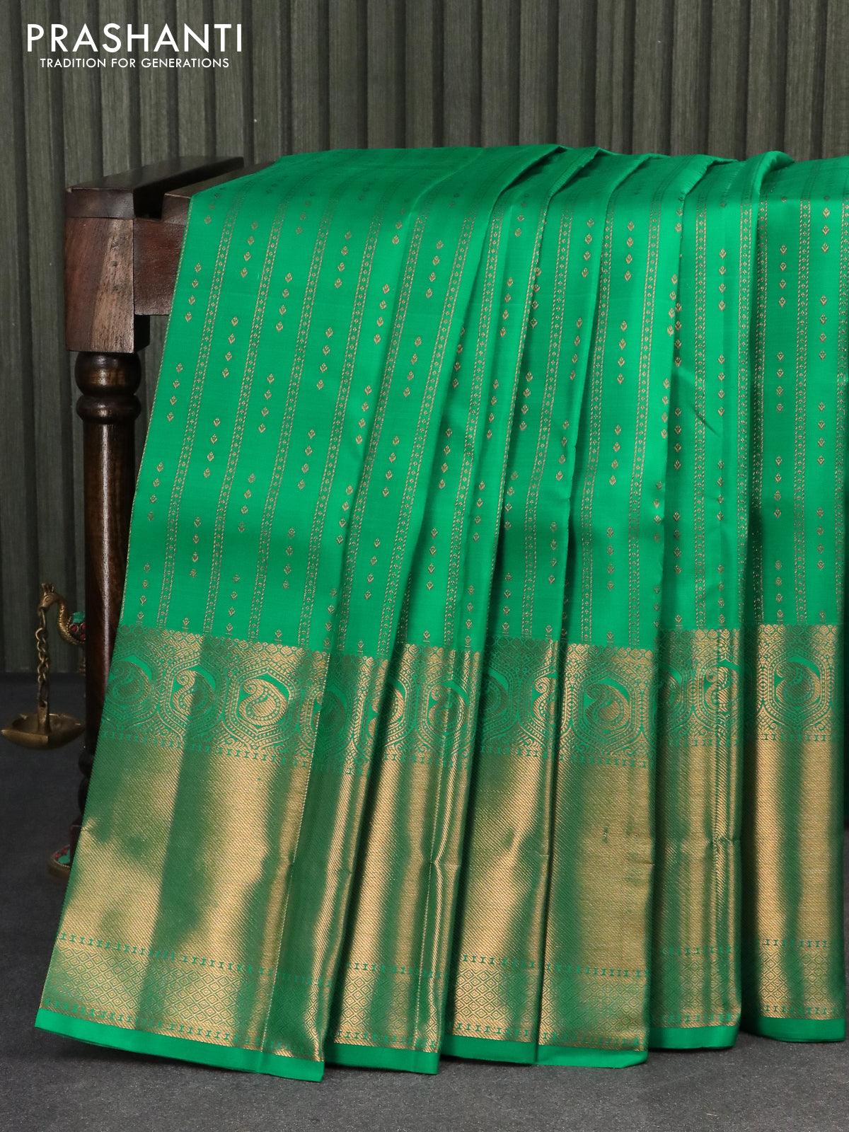 Pure kanjivaram silk saree teal green with allover zari weaves and long zari woven border