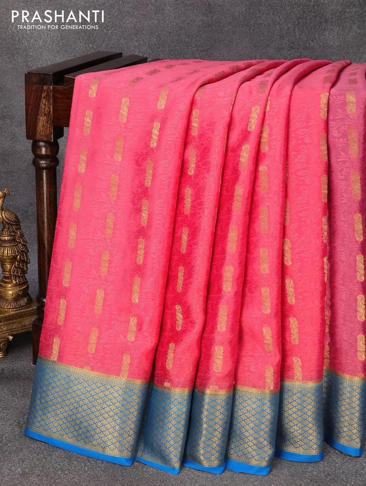 Pure mysore silk saree peach pink and cs blue with allover self emboss & zari woven buttas and zari woven border