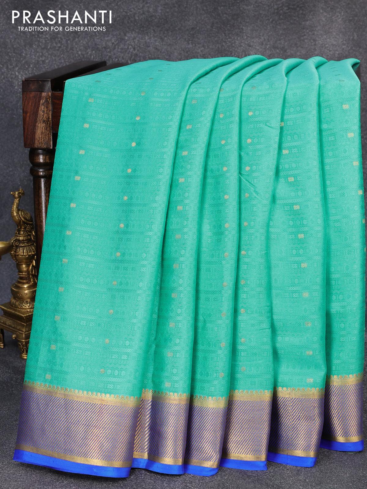 Pure mysore silk saree teal blue and royal blue with allover self emboss & zari buttas and zari woven border