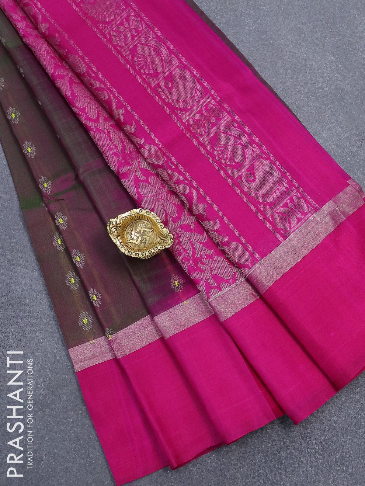 Pure uppada silk saree dual shade of green and pink with silver zari woven floral buttas and silver zari woven simple border